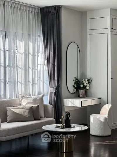Elegant living room with modern furniture and natural light