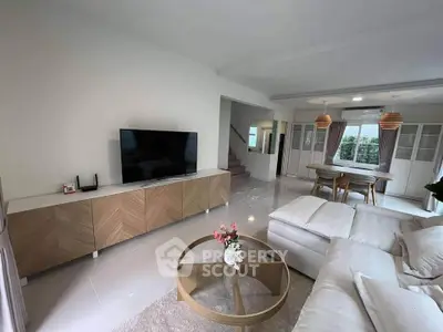 Spacious modern living room with elegant decor and natural light