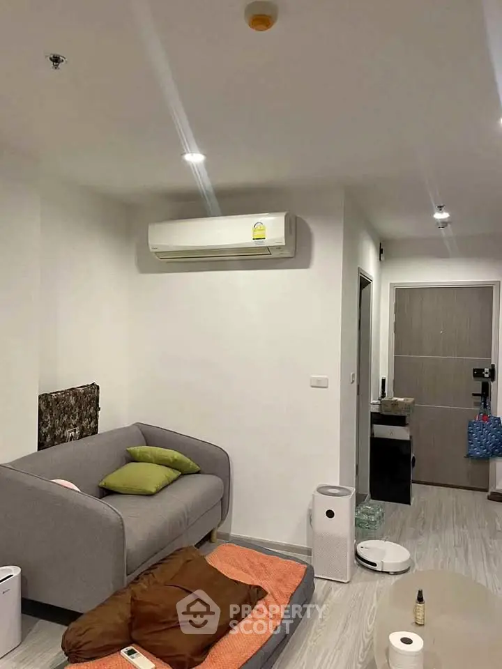 Modern living room with air conditioning and minimalist decor