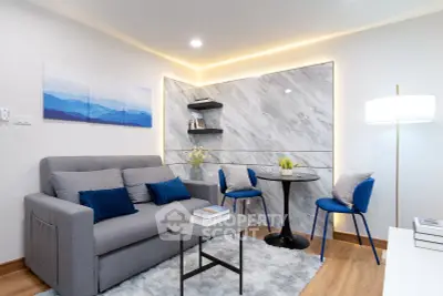 Modern living room with stylish decor and cozy seating area