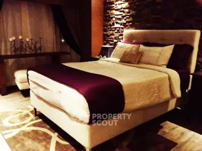 Luxurious bedroom with elegant decor and plush bedding