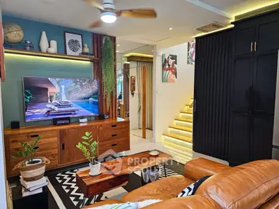 Stylish living room with modern decor, wooden furniture, and ambient lighting