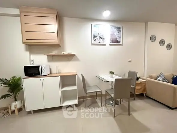 Modern living room with dining area and stylish decor