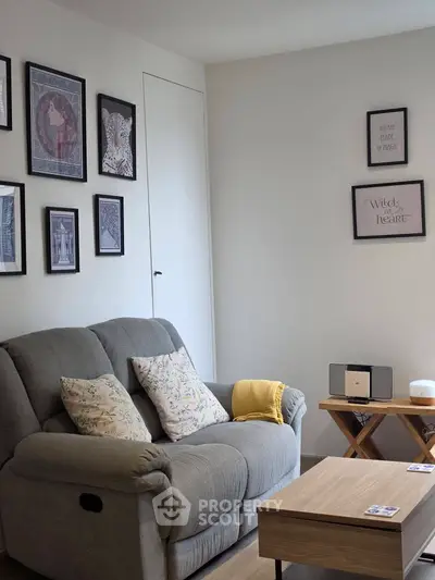 Cozy living room with stylish decor and comfortable seating, perfect for relaxation.