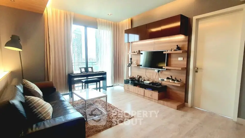 Modern living room with stylish decor and city view, featuring a piano and entertainment center.