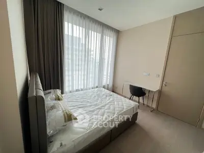 Modern bedroom with large window and minimalist decor