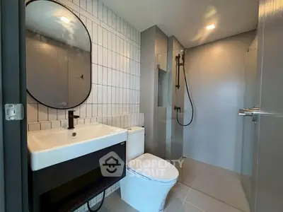 Modern bathroom with sleek fixtures and contemporary design.