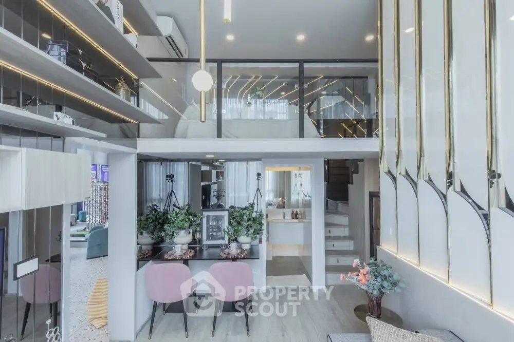 Modern duplex living room with stylish decor and mezzanine level