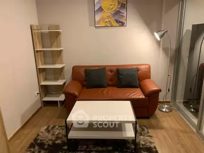 Cozy living room with leather sofa and modern decor