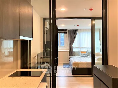 Modern studio apartment with open layout and stylish furnishings