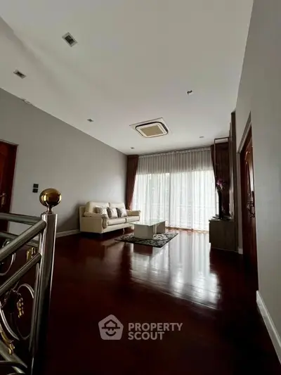 Spacious living room with elegant decor and natural light