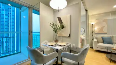 Modern apartment interior with cozy dining area and balcony view