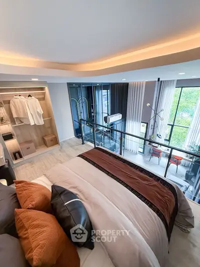Luxurious bedroom with modern decor and large windows offering a stunning view, perfect for relaxation.