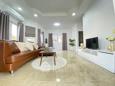 Spacious modern living room with elegant decor and natural light