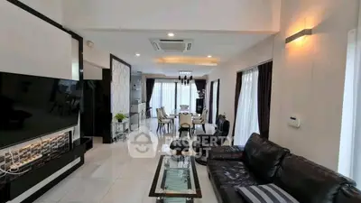 Luxurious modern living room with elegant decor and spacious dining area