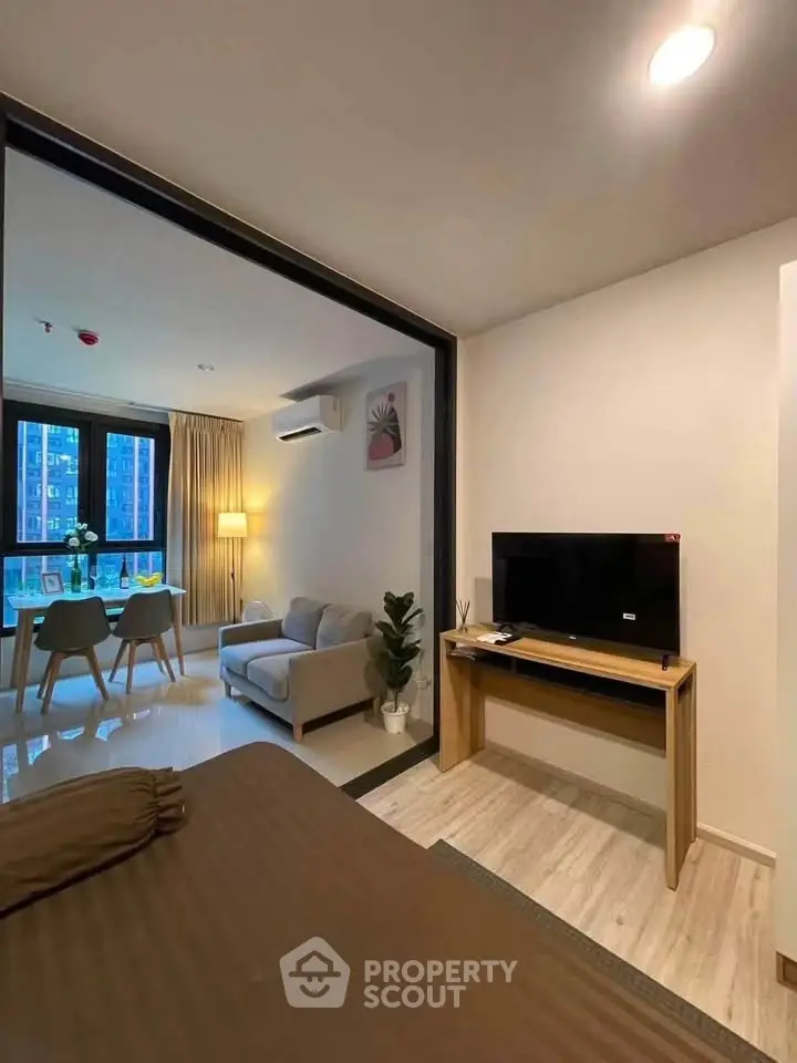 Modern studio apartment with open living area and stylish decor