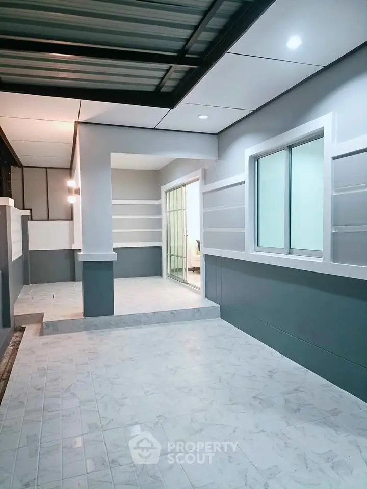 Modern exterior with sleek design and spacious patio area, perfect for relaxation and entertainment.
