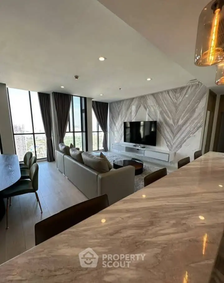 Luxurious modern living room with panoramic city view and elegant decor