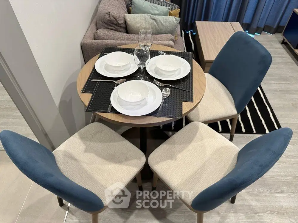 Cozy dining area with elegant table setting in modern apartment