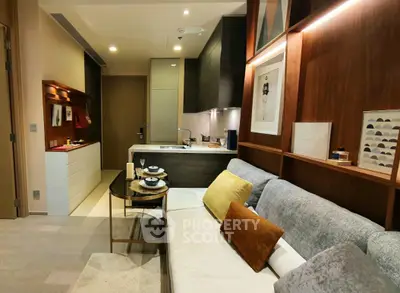 Modern living room with stylish decor and open kitchen layout