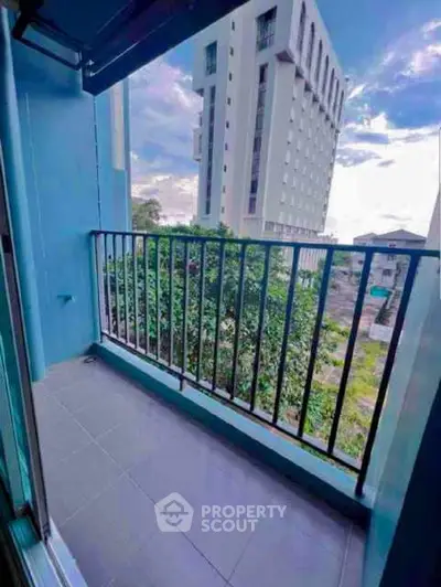 Charming balcony with city view in modern apartment building