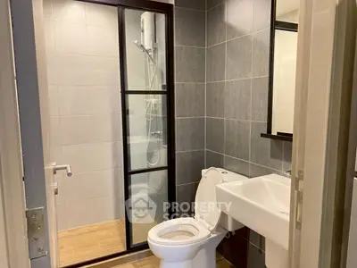 Modern bathroom with sleek shower and contemporary fixtures