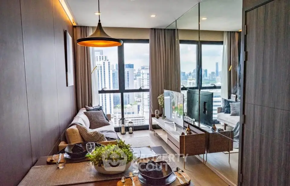 Modern living room with city view, stylish decor, and floor-to-ceiling windows in a high-rise apartment.