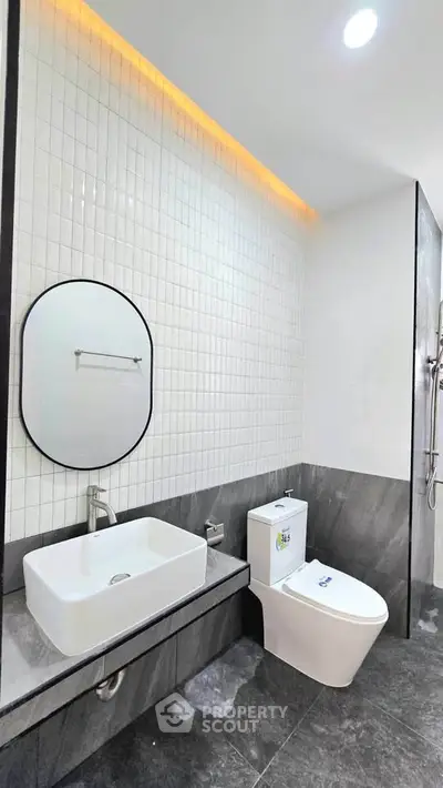 Modern bathroom with sleek fixtures and elegant tile design