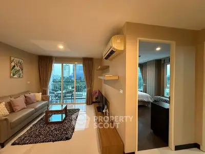 Spacious modern living room with balcony view in a stylish apartment