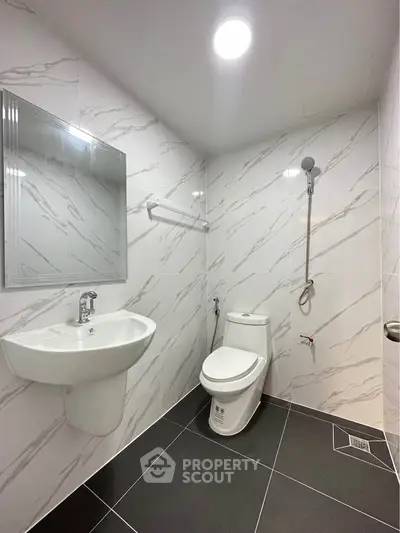 Modern bathroom with sleek fixtures and elegant tile design