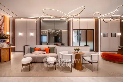 Luxurious modern living room with stylish lighting and elegant furniture.