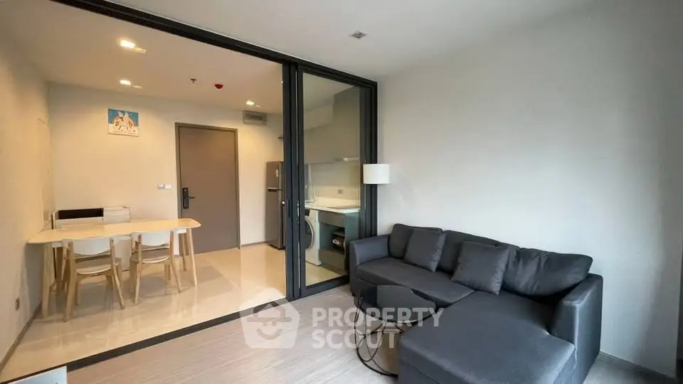 Modern living room with sleek furniture and open layout, perfect for contemporary living.