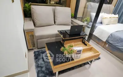 Modern living room with stylish sofa and multifunctional coffee table in cozy apartment.
