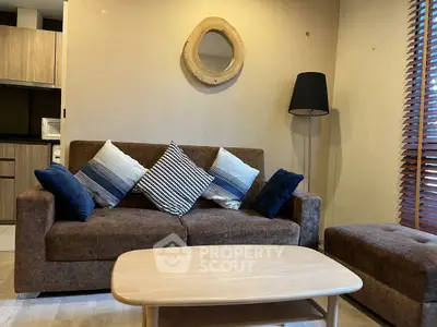 Cozy living room with stylish brown sofa and modern decor