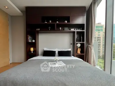 Luxurious bedroom with floor-to-ceiling windows and elegant built-in shelving in a modern apartment.