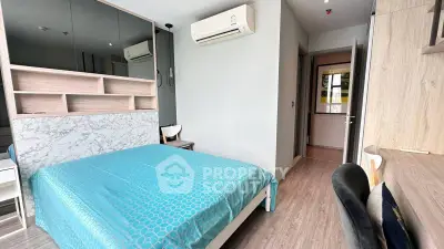 Modern bedroom with air conditioning and stylish decor in a contemporary apartment.