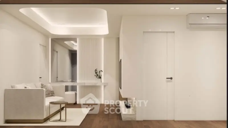 Modern minimalist living room with sleek design and neutral tones.