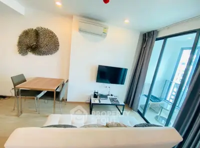 Modern living room with balcony view and stylish decor