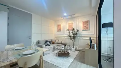 Stylish modern living room with cozy decor and elegant dining area