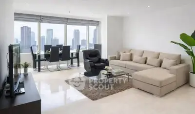 Spacious modern living room with city view, elegant furniture, and natural light.