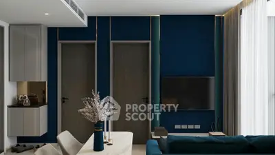 Modern living room with sleek design, featuring a wall-mounted TV and elegant decor.
