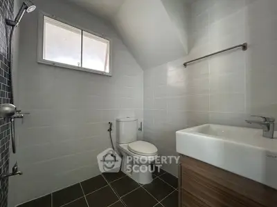 Modern bathroom with sleek fixtures and natural light