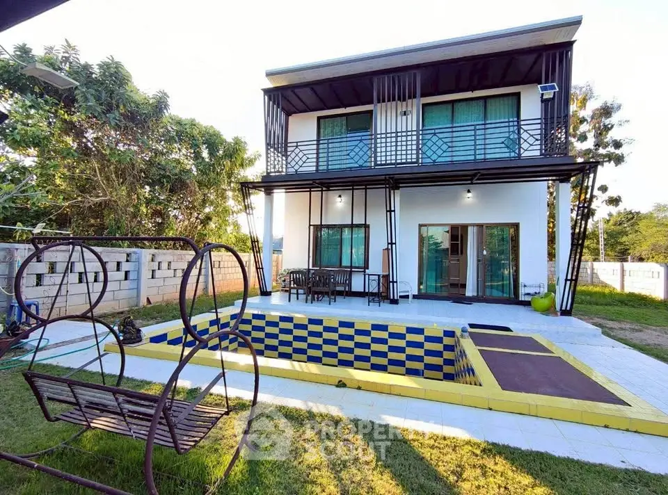 Modern two-story house with unique pool and spacious garden area.
