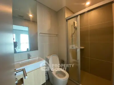 Modern bathroom with sleek shower and contemporary fixtures
