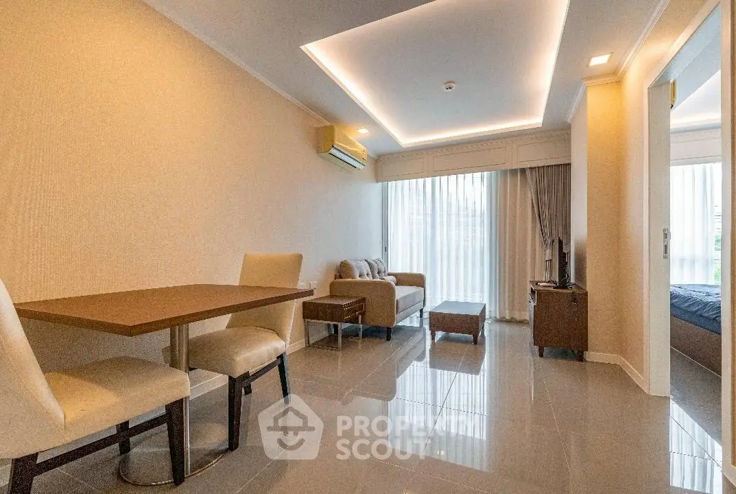 Modern living room with sleek furniture and ambient lighting