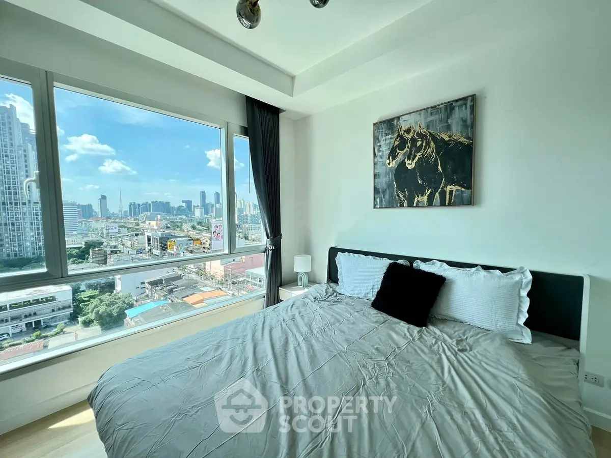 Modern bedroom with stunning city view and elegant decor