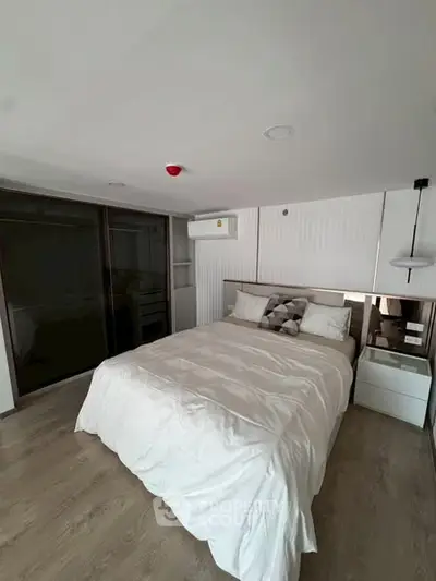 Modern bedroom with sleek design and cozy ambiance