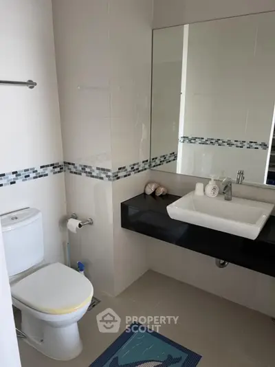 Modern bathroom with sleek design and stylish fixtures