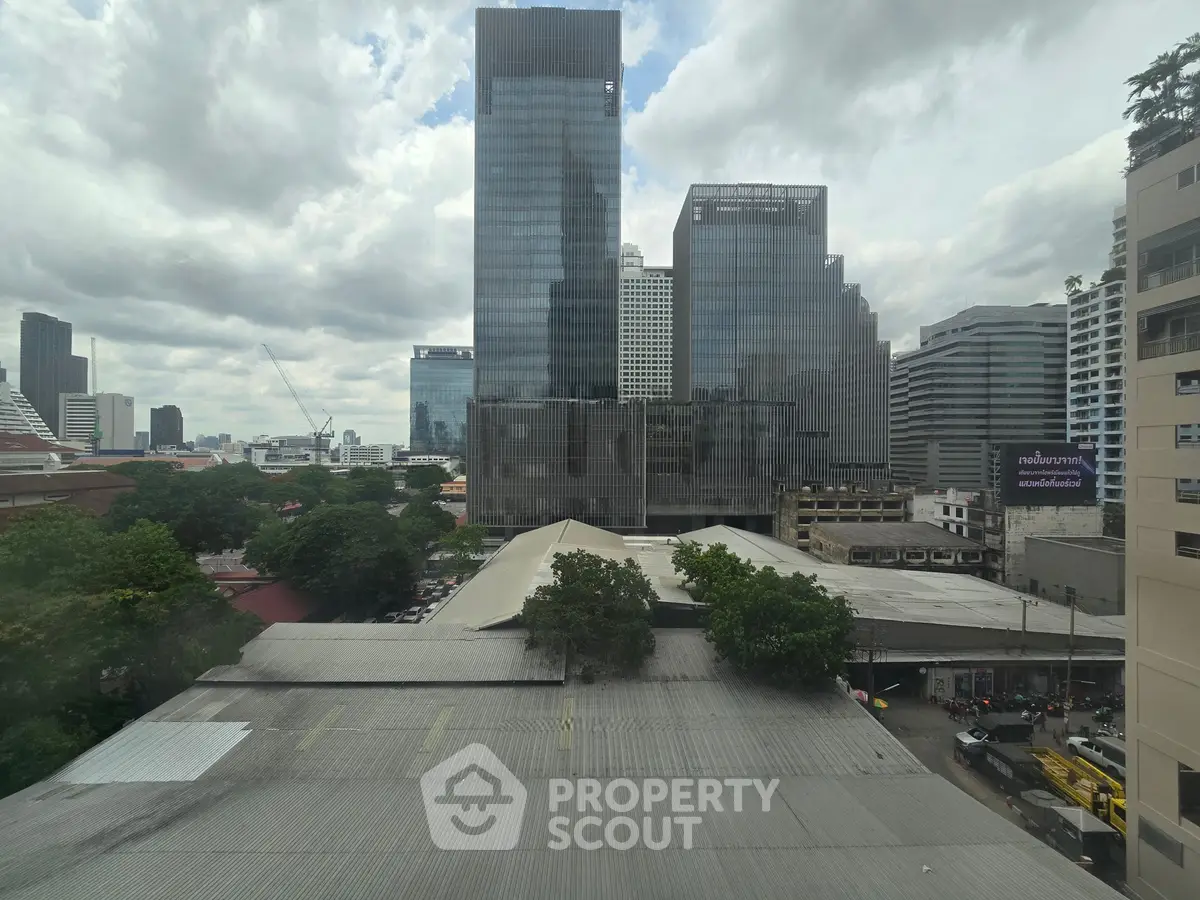 Stunning urban view showcasing modern skyscrapers and cityscape, perfect for real estate investment opportunities.