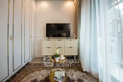 Chic living room with modern TV setup and elegant decor